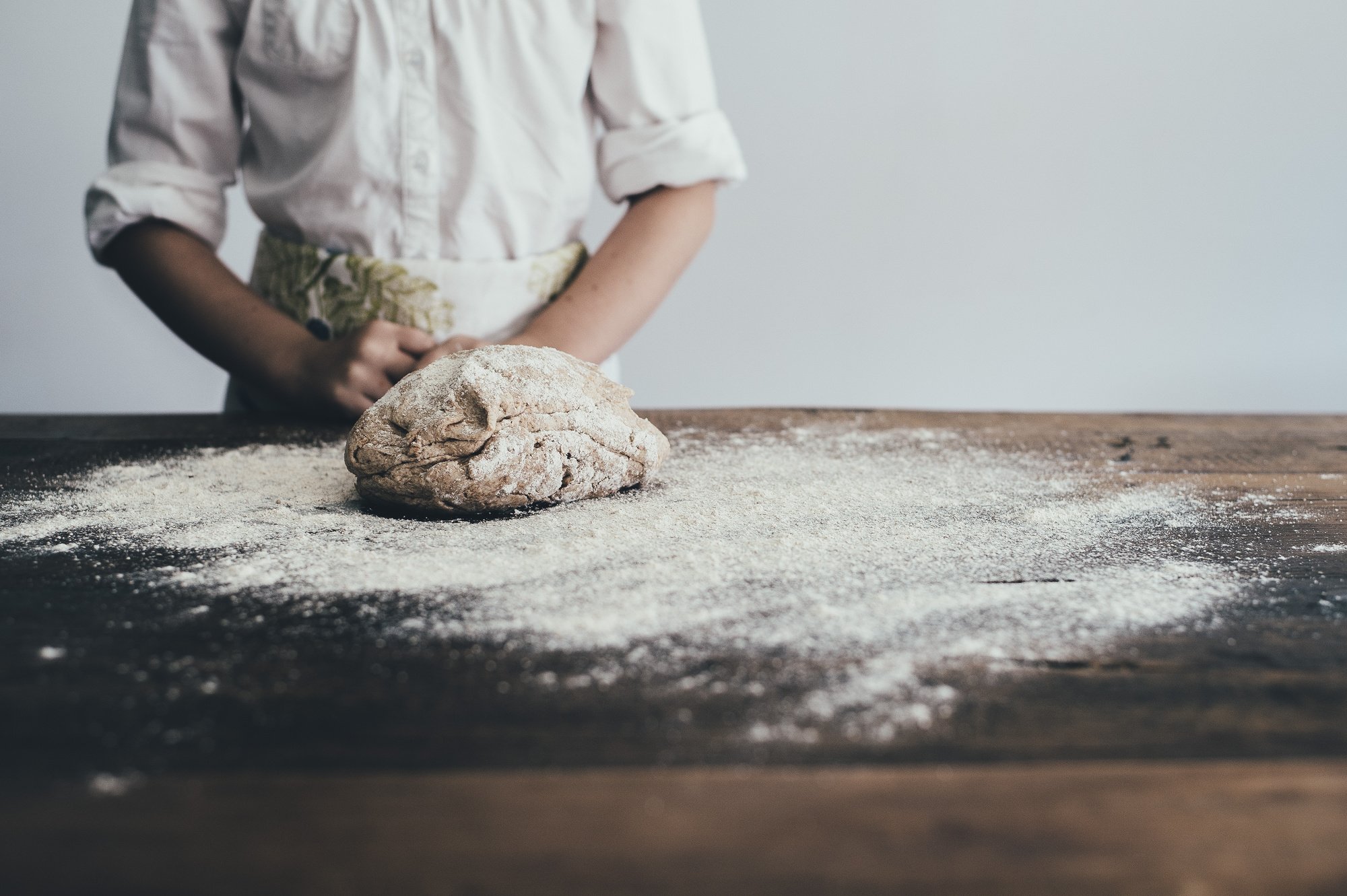 Man Preparing Dough on a Table